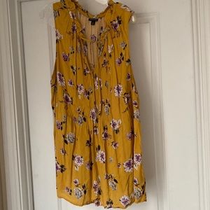 Sleeveless, mustard yellow and floral print top
